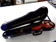 A Stentor student violin and bow in hard case