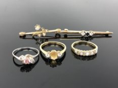 Three 9ct gold rings and two bar brooches. CONDITION REPORT: 8.
