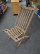 A folding teak steamer chair