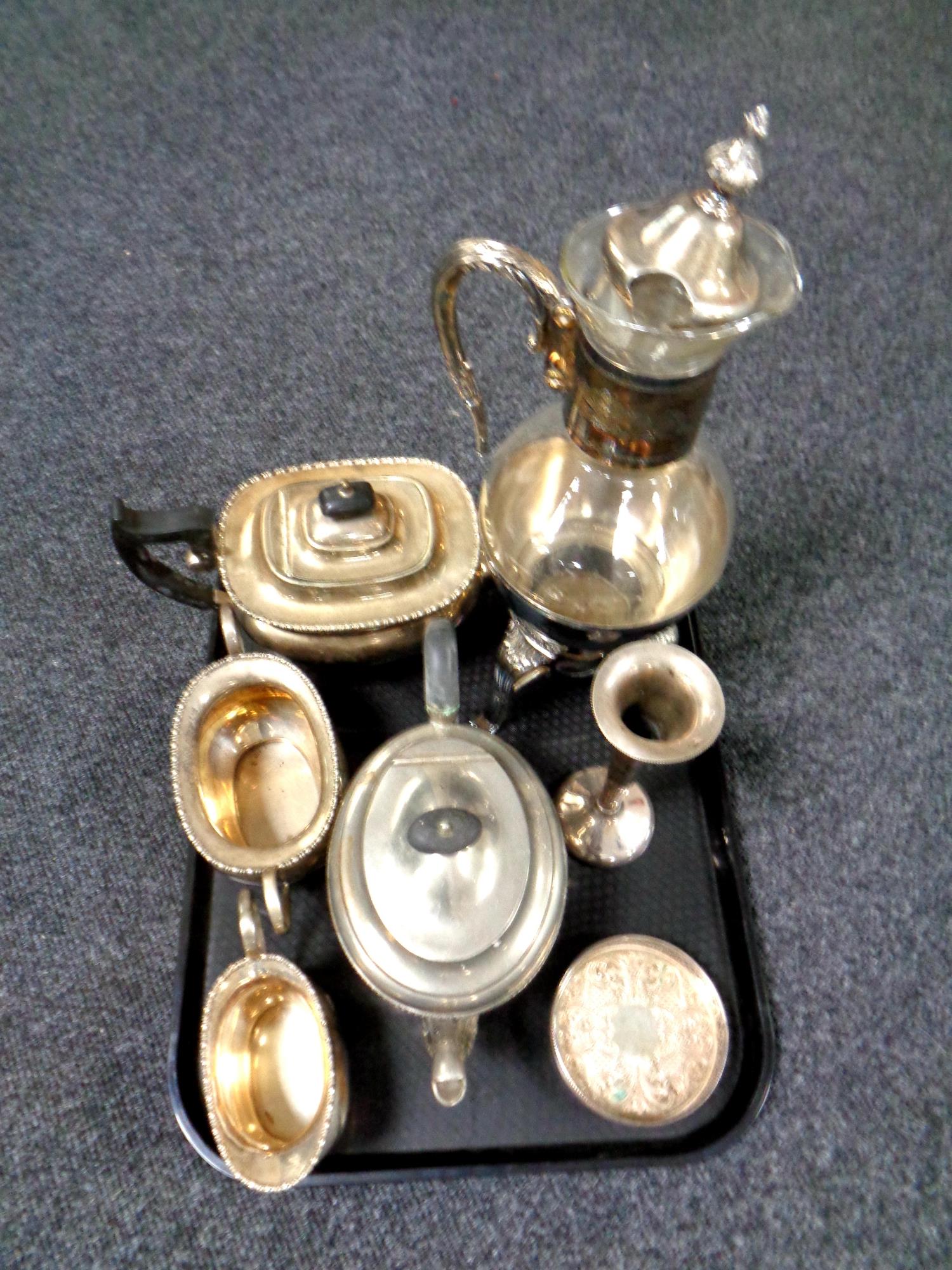 A tray containing plated wares to include three piece Sheffield plate tea service,