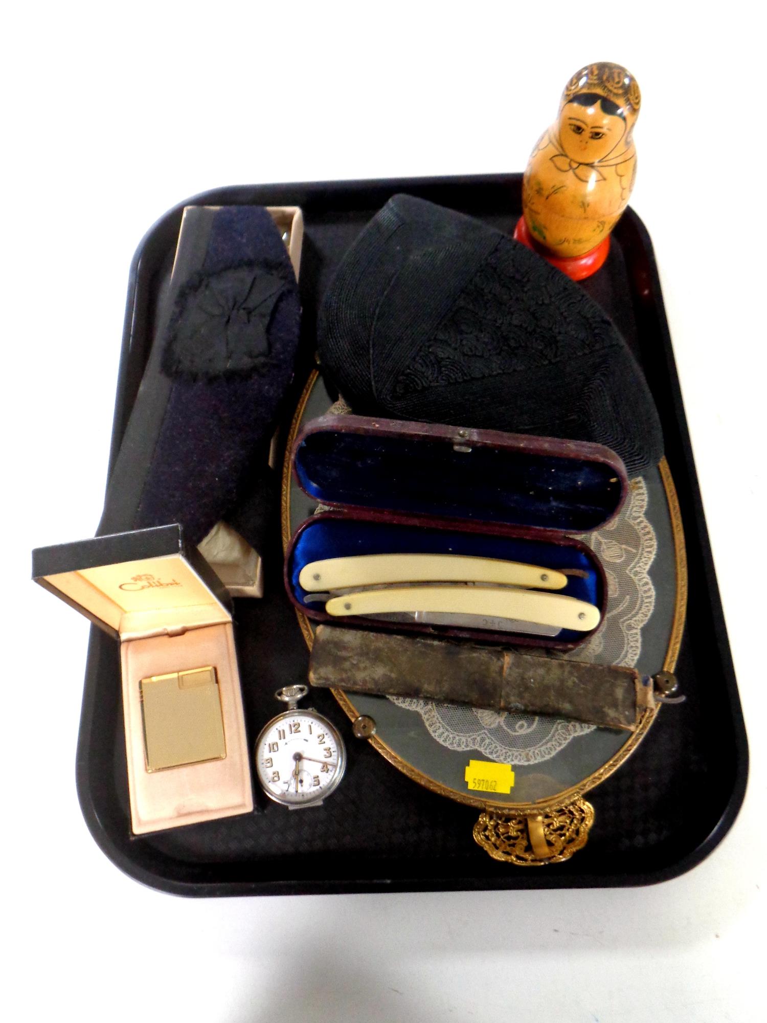 A tray containing miscellaneous to include cut throat razors, boxed Colibri lighter, pocket watch,