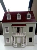A dolls house with furniture