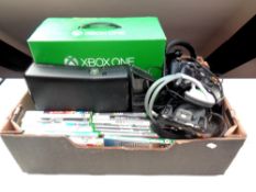 An Xbox 1 box together with an Xbox 360 controllers, leads and accessories,