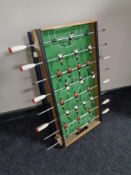 A mid 20th century folding table football game