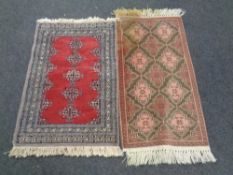 Two fringed Persian rugs