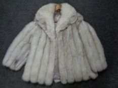 A white coney fur coat with similar hat and fur stole in box