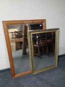 A gilt framed mirror together with a pine framed mirror