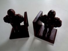 A pair of cast iron Michelin book ends