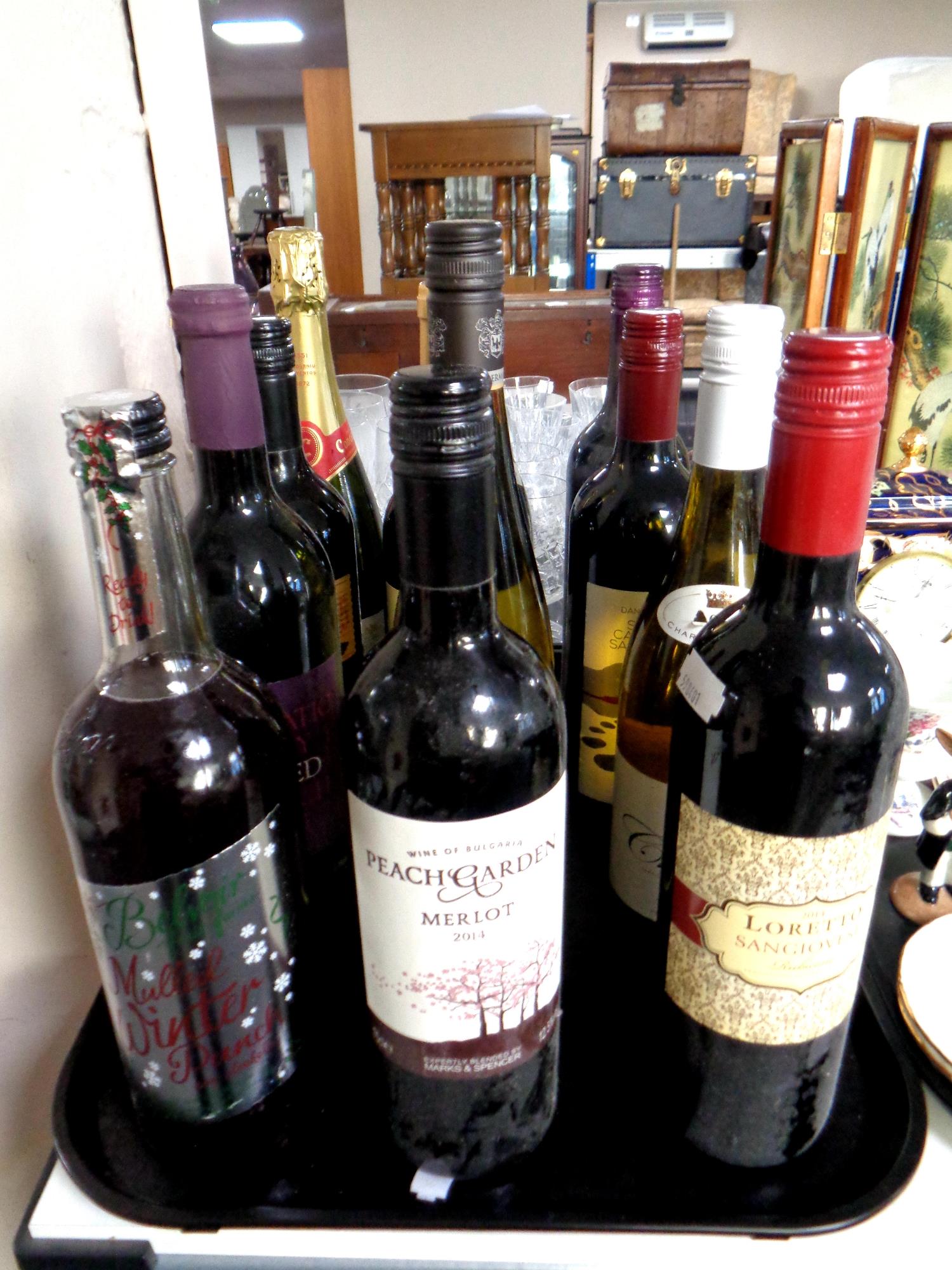 A tray containing twelve assorted bottles of wine