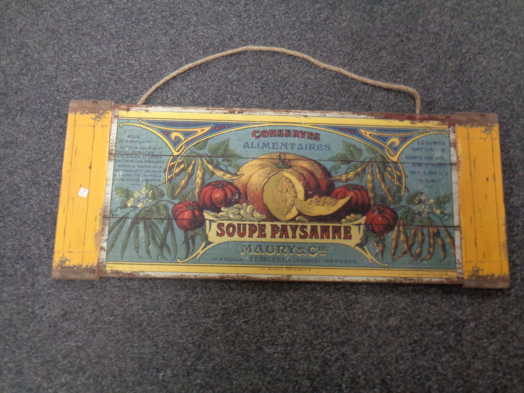 A French Soupe Paysanne advertisement on a pine board