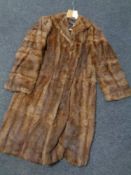 A mink three quarter length fur coat