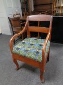An antique continental oak armchair