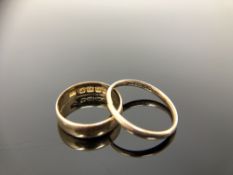 A 9ct gold band ring (shank split), together with an 18ct gold ring.