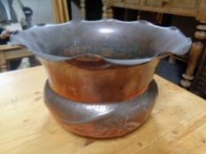 An Arts and Crafts copper plant pot