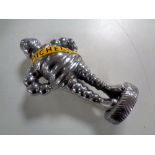 An aluminium figure - Michelin man