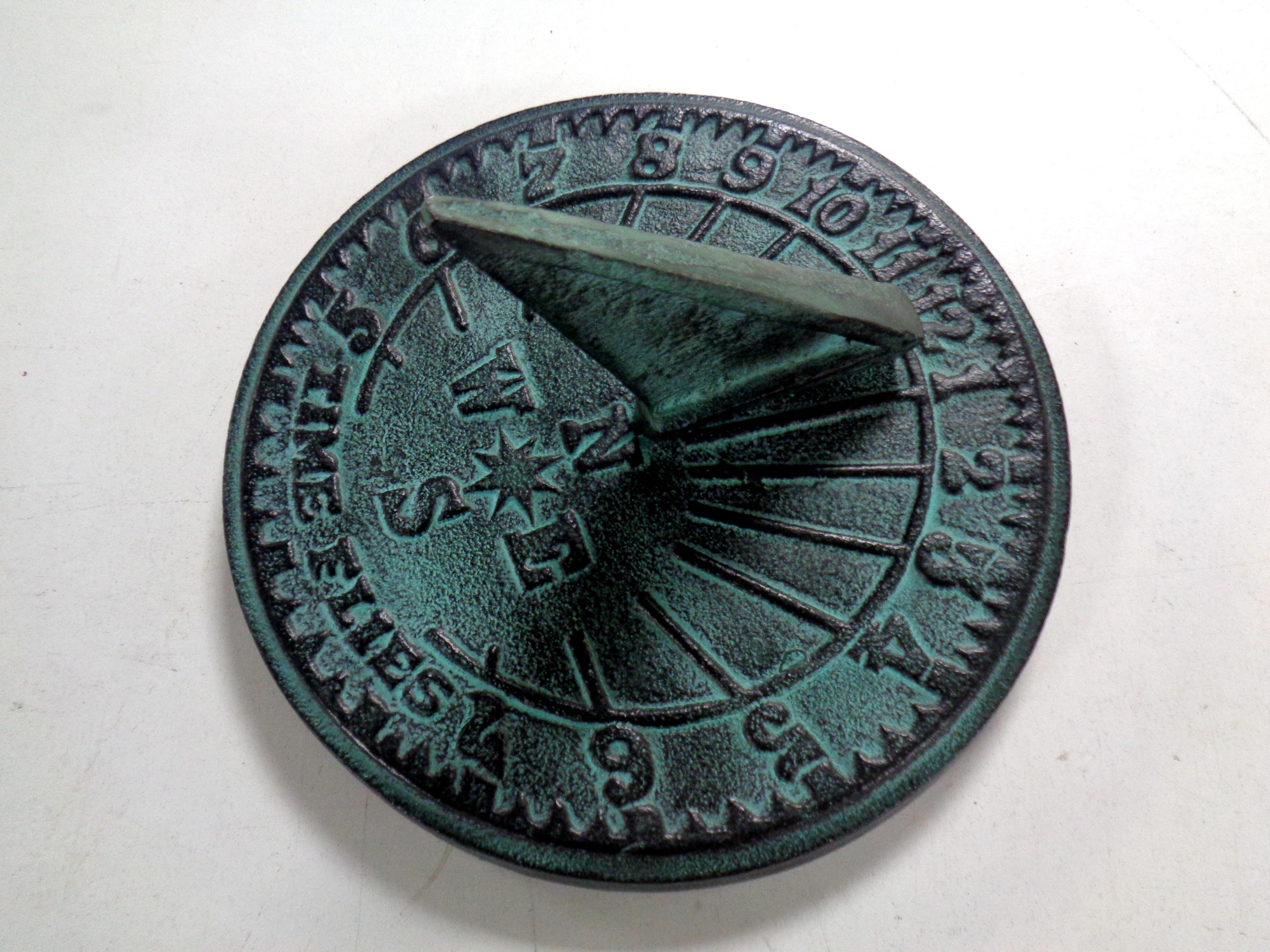 A cast iron Time Flies sundial