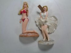 Two cast iron door stops - Marilyn Monroe and Valeria