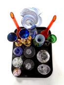 A tray containing assorted glassware to include glass paperweights to include Mdina,
