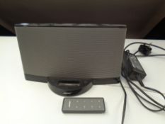 A Bose ipod dock with remote