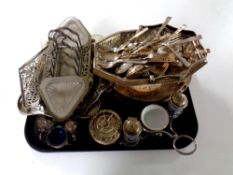 A tray containing a quantity of plated wares to include assorted cutlery, toast rack, cruet sets,