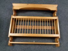 A pine wall mounted plate rack
