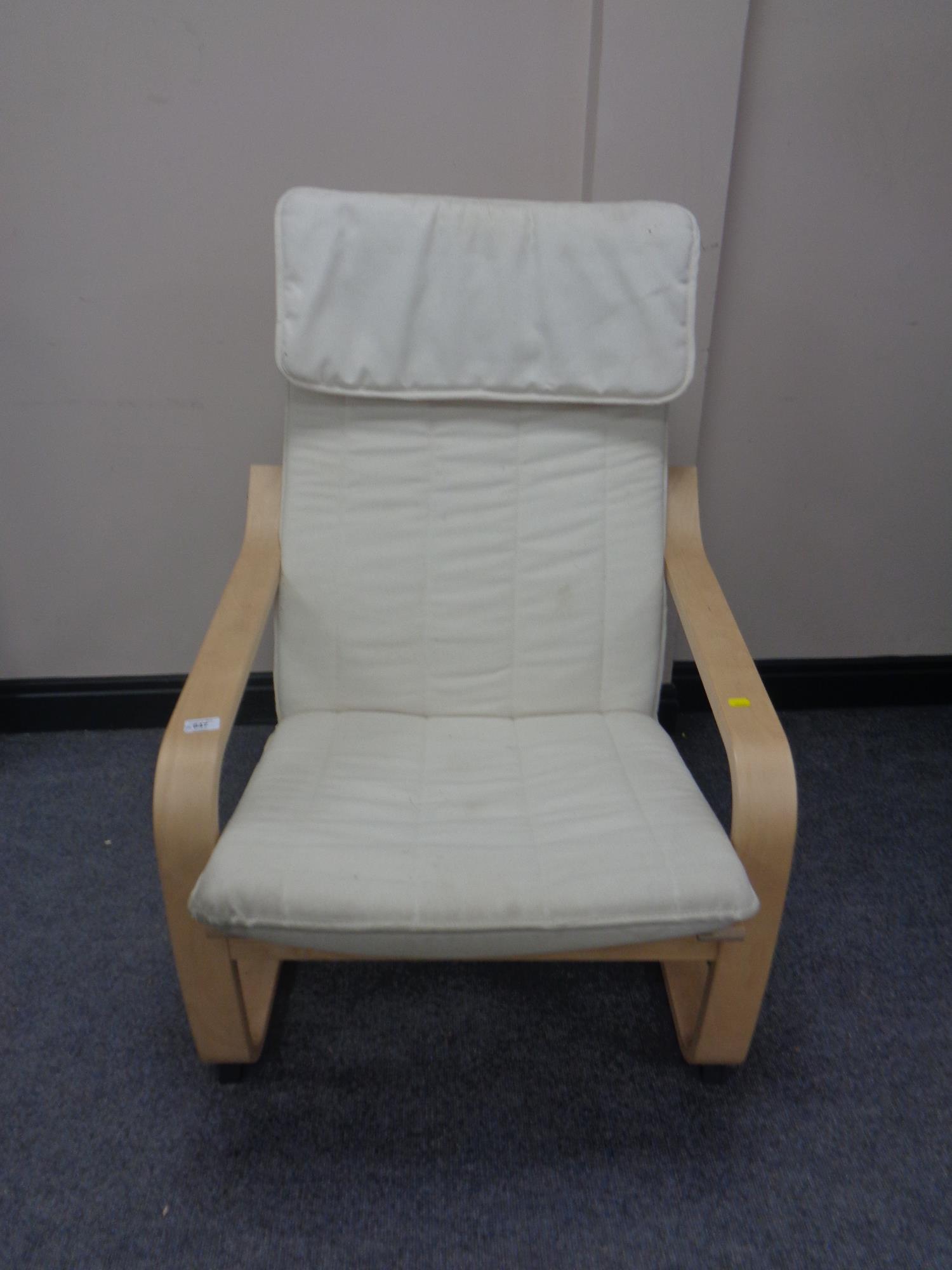 A beech framed Ikea relaxer chair