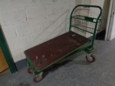 A large flatbed trolley (green)