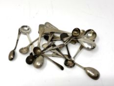 Twenty-one assorted silver salt/mustard spoons including Victorian and Georgian examples.