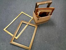 A box of assorted picture frames