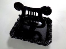 A cast iron boot scraper