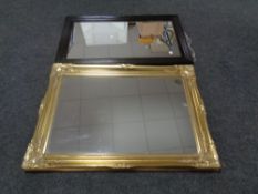 An Edwardian oak framed mirror together with a gilt framed mirror