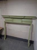 An antique painted pine fire surround together with a further pine fire surround (a/f)