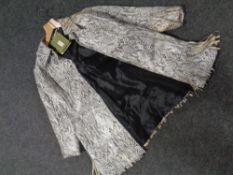 A vintage faux snakeskin coat
