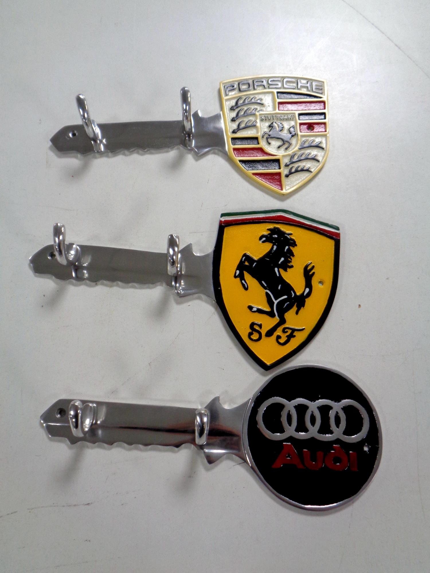 Three aluminium key racks, Porsche,
