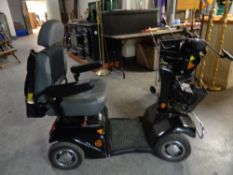 A Rascal mobility scooter with key and charger