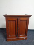 A 19th century mahogany double door cabinet,