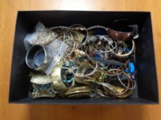 A box containing a large quantity of costume jewellery to include beaded necklaces,