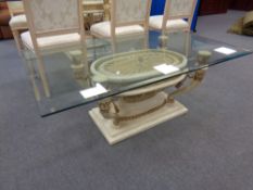 A Barker and Stonehouse Empire style glass topped pedestal coffee table