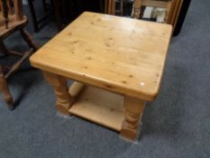 A square pine two tier coffee table
