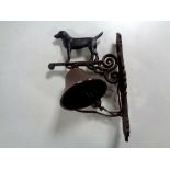 A cast iron labrador wall bracket with bell
