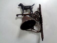 A cast iron labrador wall bracket with bell