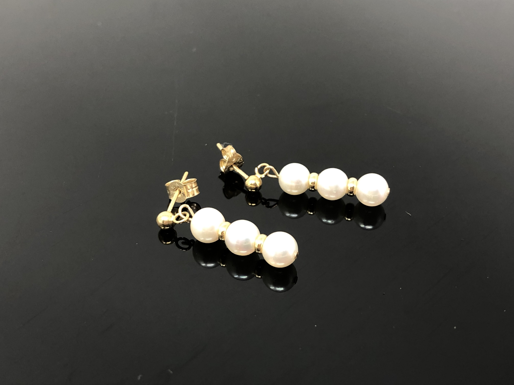 A pair of 14ct gold pearl earrings