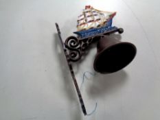 A cast iron ship wall bracket with bell