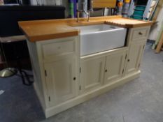A painted pine farmhouse kitchen sink unit with Armitage Shanks Belfast sink fitted cupboards