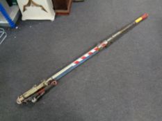 A large metal commerical tow pole (tows approximately 2 tons).