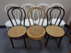 A set of four plastic Ikea Bentwood chairs together with three further wooden Bentwood chairs