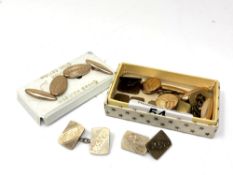 A pair of silver cuff links and several other pairs of rolled gold cuff links.