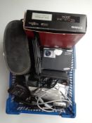 A basket of digital cameras, cased Prinzlux 10 x 50 binoculars, dictaphone,