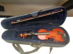 A Mayflower 1/4 size violin and bow in case