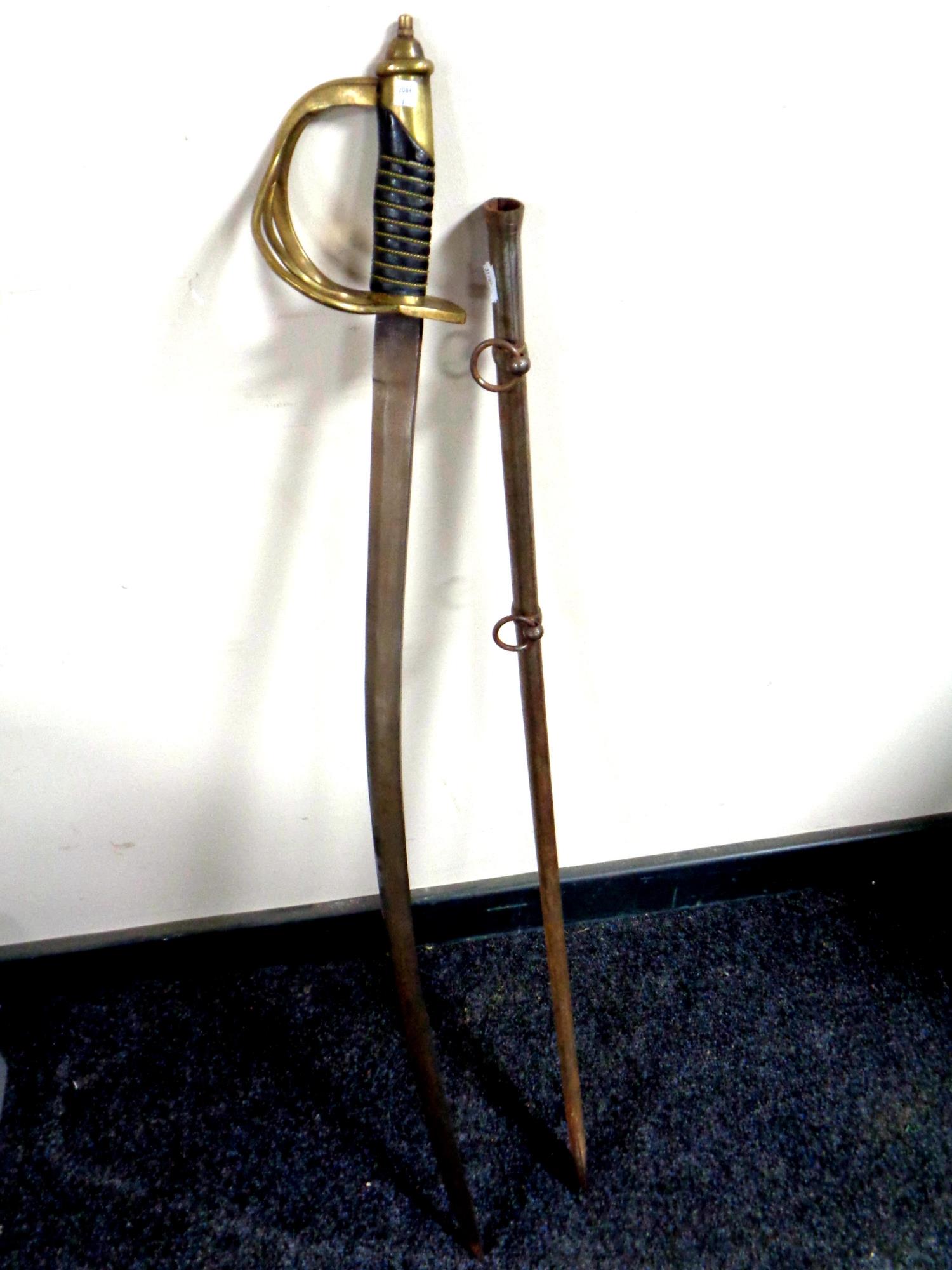 A 19th century style cavalry sabre in scabbard
